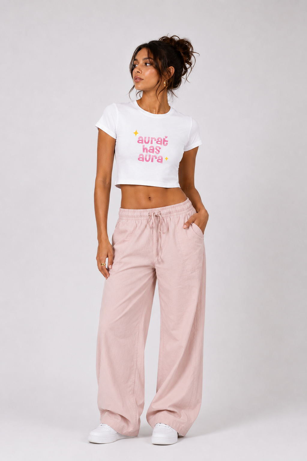 Aurat Has Aura Women’s White Graphic Crop Top by StitchVaults™