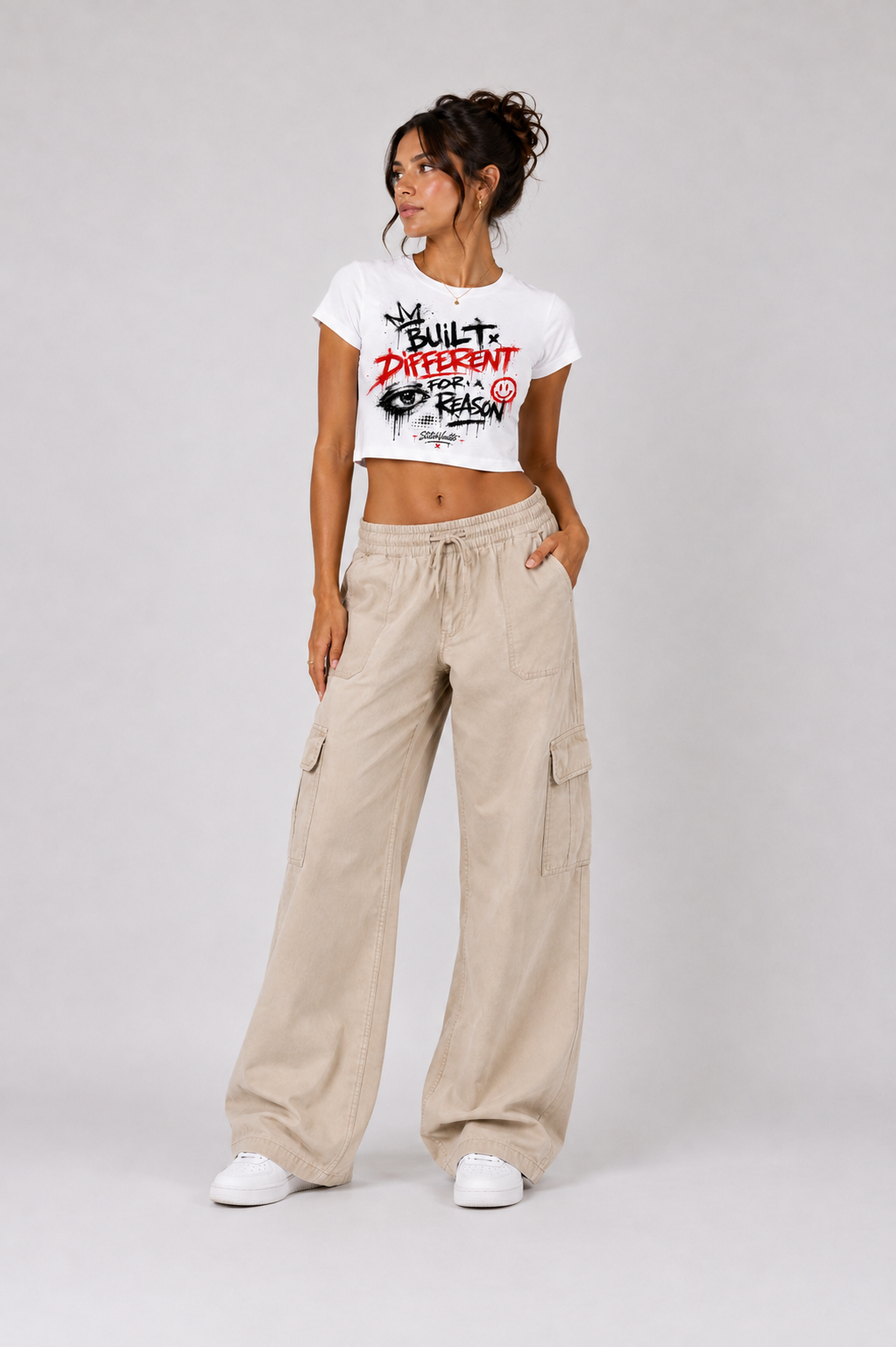 Built Different Women’s White Graphic Crop Top by StitchVaults™